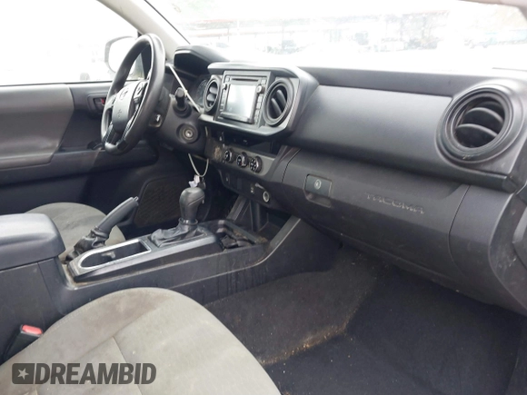 2018 Toyota Tacoma SR with VIN 5TFRX5GN9JX114752, listed as a IAAI auction lot 41313849 with 248,901 mi miles and . Bid and sale history available at DreamBid. Image 5.