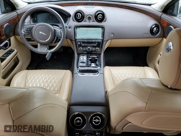2018 Jaguar XJ Portfolio with VIN SAJWJ2GD9J8W15663, listed as a Copart auction lot 56734515 with 9,374 mi miles and Salvage Title. Bid and sale history available at DreamBid. Image 8.
