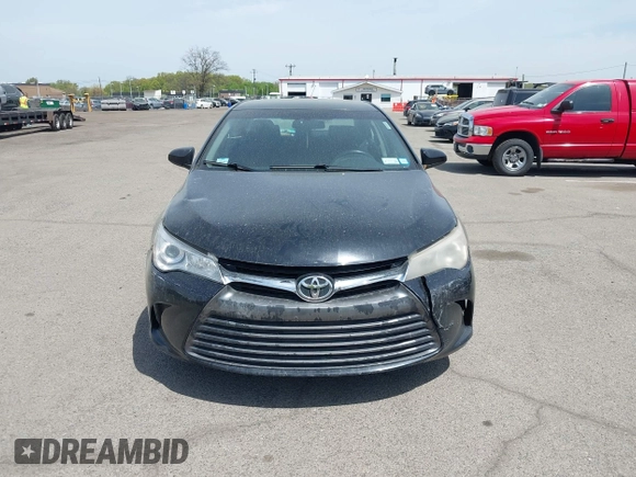 2015 Toyota Camry LE with VIN 4T1BD1FKXFU164963, listed as a IAAI auction lot 42132724 with 141,089 mi miles and . Bid and sale history available at DreamBid. Image 12.