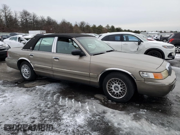 2001 Mercury Grand Marquis GS z VIN 2MEFM74W11X701900, wystawiony jako Copart lot #41913965 z przebiegiem 79 360 mil mil oraz Czysty tytuł • Clean title. Historia ofert i sprzedaży dostępna na DreamBid. Obrazek 4.