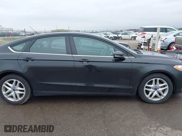2015 Ford Fusion SE z VIN 3FA6P0H72FR305506, wystawiony jako IAAI lot #42139545 z przebiegiem 94 461 mil mil oraz . Historia ofert i sprzedaży dostępna na DreamBid. Obrazek 13.