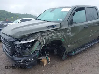 2021 Ram 1500 Lone Star with VIN 1C6SRFFT6MN695393, listed as a IAAI auction lot 42344282 with 12,796 mi miles and . Bid and sale history available at DreamBid. Image 6.