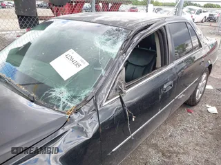2008 Cadillac DTS 1SA z VIN 1G6KD57Y98U102801, wystawiony jako IAAI lot #42204185 z przebiegiem 152 990 mil mil oraz . Historia ofert i sprzedaży dostępna na DreamBid. Obrazek 12.