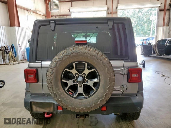 2018 Jeep Wrangler Unlimited Rubicon z VIN 1C4HJXFG5JW111896, wystawiony jako Copart lot #65800475 z przebiegiem Nie podano mil oraz Szkoda całkowita • Salvage title. Historia ofert i sprzedaży dostępna na DreamBid. Obrazek 6.