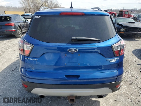 2017 Ford Escape Titanium with VIN 1FMCU9J9XHUA93760, listed as a Copart auction lot 50472375 with 104,247 mi miles and Salvage Title. Bid and sale history available at carsss.com. Image 6.