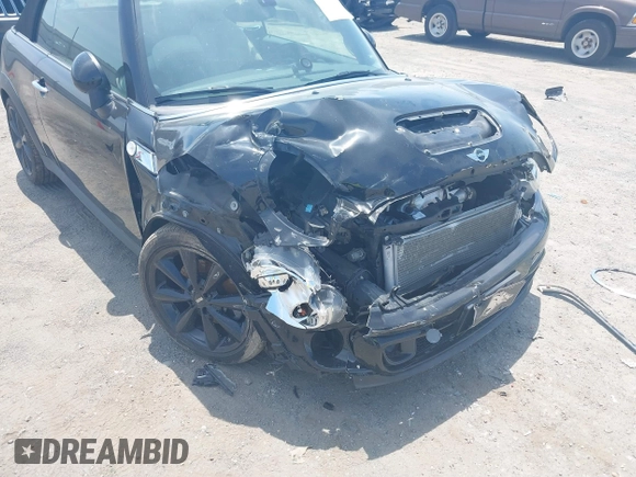 2013 MINI Convertible S with VIN WMWZP3C59DT550746, listed as a IAAI auction lot 39538986 with 59,934 mi miles and . Bid and sale history available at DreamBid. Image 6.