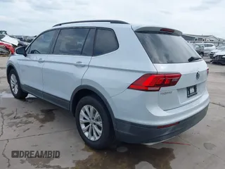 2018 Volkswagen Tiguan S with VIN 3VV1B7AX0JM092116, listed as a IAAI auction lot 42388339 with 103,412 mi miles and . Bid and sale history available at DreamBid. Image 3.