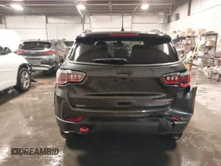 2018 Jeep Compass Trailhawk with VIN 3C4NJDDB4JT210451, listed as a IAAI auction lot 41239258 with 90,552 mi miles and . Bid and sale history available at carsss.com. Image 16.