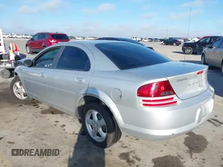 2005 Dodge Stratus SXT z VIN 1B3EL46R65N617926, wystawiony jako IAAI lot #41658286 z przebiegiem 75 030 mil mil oraz . Historia ofert i sprzedaży dostępna na DreamBid. Obrazek 3.