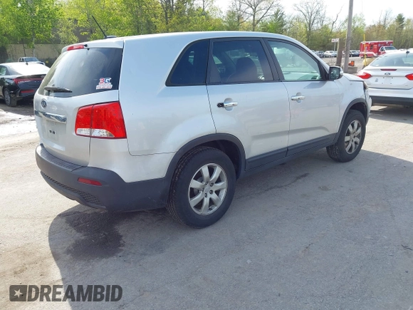 2011 Kia Sorento LX with VIN 5XYKT3A12BG160242, listed as a IAAI auction lot 42220874 with 142,298 mi miles and . Bid and sale history available at carsss.com. Image 4.