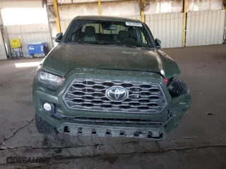 2022 Toyota Tacoma 4WD SR with VIN 3TYCZ5AN0NT055986, listed as a Copart auction lot 50165995 with 52,628 mi miles and Salvage Title. Bid and sale history available at carsss.com. Image 5.