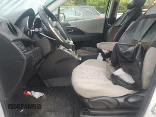2012 Mazda 5 Sport with VIN JM1CW2BL4C0141205, listed as a Copart auction lot 71437504 with 135,271 mi miles and Salvage Title. Bid and sale history available at DreamBid. Image 7.