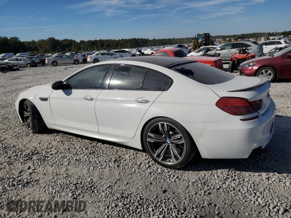 2015 BMW M6 z VIN WBS6C9C58FD467867, wystawiony jako Copart lot #75966844 z przebiegiem 94 102 mil mil oraz Szkoda całkowita • Salvage title. Historia ofert i sprzedaży dostępna na DreamBid. Obrazek 2.