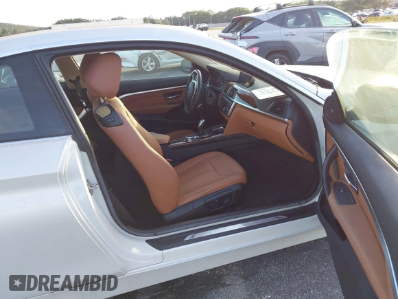 2014 BMW 4 Series 435i with VIN WBA3R1C51EK192795, listed as a IAAI auction lot 41263037 with 22,937 mi miles and . Bid and sale history available at DreamBid. Image 5.