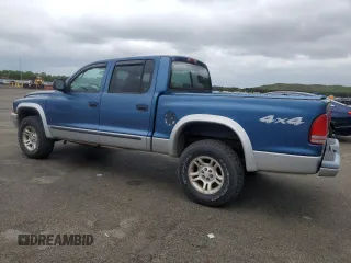 2004 Dodge Dakota SLT z VIN 1D7HG48K04S739865, wystawiony jako Copart lot #57867265 z przebiegiem 214 698 mil mil oraz Tytuł czysty. Historia ofert i sprzedaży dostępna na DreamBid. Obrazek 2.