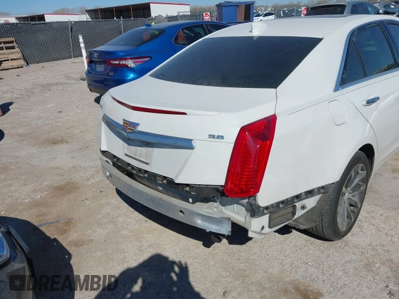 2016 Cadillac CTS with VIN 1G6AR5SS1G0112728, listed as a IAAI auction lot 41830547 with 100,610 mi miles and . Bid and sale history available at DreamBid. Image 6.
