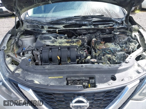 2019 Nissan Sentra S z VIN 3N1AB7AP0KY310003, wystawiony jako IAAI lot #41778223 z przebiegiem Nie podano mil oraz . Historia ofert i sprzedaży dostępna na DreamBid. Obrazek 10.