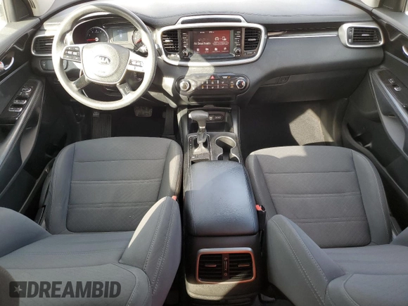 2020 Kia Sorento LX z VIN 5XYPG4A31LG633261, wystawiony jako Copart lot #82196714 z przebiegiem 214 220 mil mil oraz Szkoda całkowita • Salvage title. Historia ofert i sprzedaży dostępna na DreamBid. Obrazek 8.