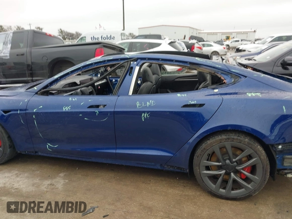 2021 Tesla Model S Plaid with VIN 5YJSA1E60MF440042, listed as a IAAI auction lot 41563347 with 40,981 mi miles. Bid and sale history available at carsss.com. Image 14.
