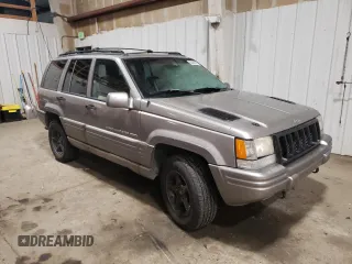 1998 Jeep Grand Cherokee Limited with VIN 1J4GZ88Z1WC289820, listed as a Copart auction lot 88583995 with 245,572 mi miles and Clean Title. Bid and sale history available at carsss.com. Image 4.
