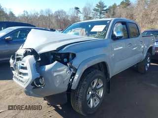 2018 Toyota Tacoma SR with VIN 3TMGZ5AN7JM165084, listed as a IAAI auction lot 41620305 with 21,010 mi miles. Bid and sale history available at carsss.com. Image 2.