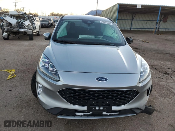 2021 Ford Escape Titanium with VIN 1FMCU9J97MUA70995, listed as a Copart auction lot 87004884 with Not Provided miles and Salvage Title. Bid and sale history available at carsss.com. Image 5.