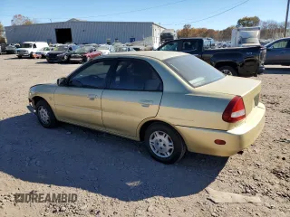 1997 Mitsubishi Mirage z VIN JA3AY36A9VU027615, wystawiony jako Copart lot #77401214 z przebiegiem 104 407 mil mil oraz Szkoda całkowita • Salvage title. Historia ofert i sprzedaży dostępna na DreamBid. Obrazek 2.