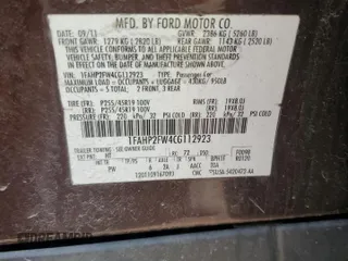 2012 Ford Taurus Limited z VIN 1FAHP2FW4CG112923, wystawiony jako Copart lot #56169085 z przebiegiem 142 687 mil mil oraz Szkoda całkowita • Salvage title. Historia ofert i sprzedaży dostępna na DreamBid. Obrazek 12.