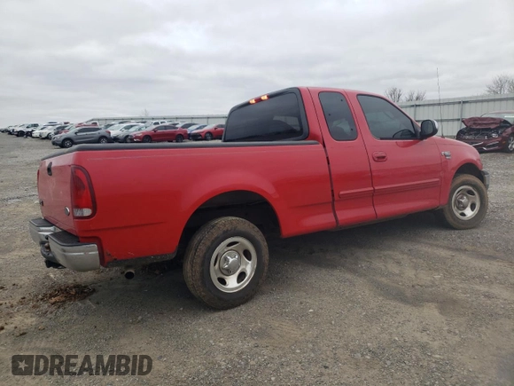 2002 Ford F-150 XL with VIN 1FTRX17W12NB06157, listed as a Copart auction lot 51209485 with 167,953 mi miles and Salvage Title. Bid and sale history available at carsss.com. Image 3.