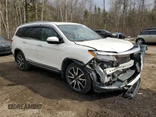 2019 Honda Pilot Touring 7-Passenger with VIN 5FNYF6H64KB503239, listed as a Copart auction lot 52936035 with 83,619 mi miles and Salvage Title. Bid and sale history available at DreamBid. Image 4.