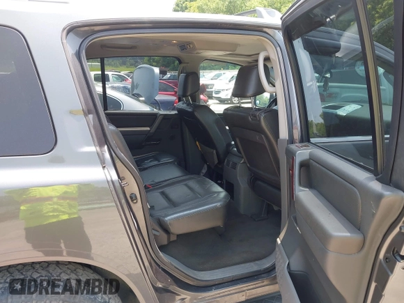 2005 Nissan Armada SE z VIN 5N1AA08B35N716999, wystawiony jako IAAI lot #42389230 z przebiegiem 185 588 mil mil oraz . Historia ofert i sprzedaży dostępna na DreamBid. Obrazek 8.