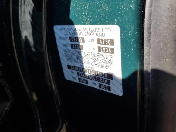 2004 Jaguar XJ with VIN SAJWA71C34SG16508, listed as a Copart auction lot 66751644 with 179,039 mi miles and Salvage Title. Bid and sale history available at carsss.com. Image 12.