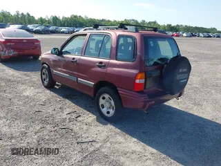 2003 Suzuki Vitara z VIN 2S3TE52V236103499, wystawiony jako IAAI lot #42285161 z przebiegiem 97 533 mil mil oraz . Historia ofert i sprzedaży dostępna na DreamBid. Obrazek 3.