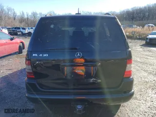 2001 Mercedes-Benz M-Class with VIN 4JGAB72EX1A277472, listed as a Copart auction lot 86857214 with 0 mi miles and Salvage Title. Bid and sale history available at carsss.com. Image 6.