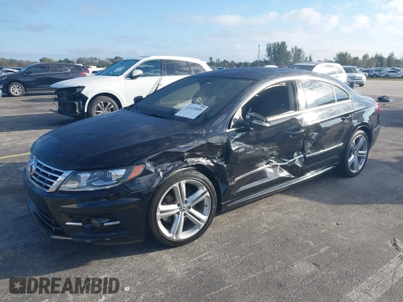 2016 Volkswagen CC Sport with VIN WVWBP7AN8GE502338, listed as a IAAI auction lot 41535048 with 71,645 mi miles. Bid and sale history available at carsss.com. Image 2.