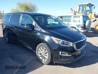 2020 Kia Sedona EX with VIN KNDMB5C11L6594029, listed as a IAAI auction lot 40951800 with 164,989 mi miles. Bid and sale history available at carsss.com. Image 1.