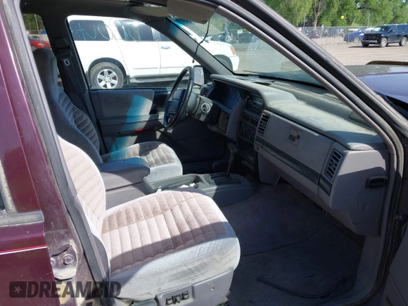 1994 Jeep Grand Cherokee Laredo with VIN 1J4GZ58Y2RC112641, listed as a IAAI auction lot 42212705 with 160,762 mi miles and . Bid and sale history available at DreamBid. Image 5.