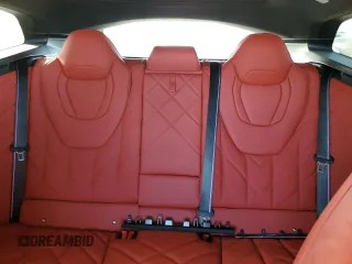 2024 BMW XM z VIN 5YM23CS06R9U92810, wystawiony jako Copart lot #75401504 z przebiegiem 6181 mil mil oraz Nie do naprawy. Historia ofert i sprzedaży dostępna na DreamBid. Obrazek 10.