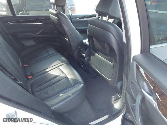 2016 BMW X5 xDrive35i with VIN 5UXKR0C52G0P29633, listed as a IAAI auction lot 41057391 with 176,697 mi miles. Bid and sale history available at carsss.com. Image 8.