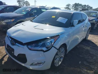 2013 Hyundai Veloster w/Black Int with VIN KMHTC6AD5DU116443, listed as a IAAI auction lot 41635858 with 170,173 mi miles. Bid and sale history available at carsss.com. Image 2.