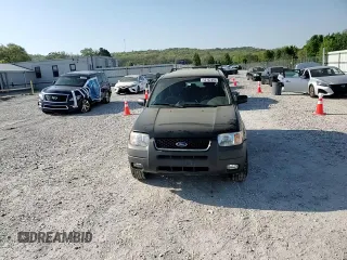 2003 Ford Escape XLT Popular with VIN 1FMYU03163KC66848, listed as a Copart auction lot 53102465 with 79,158 mi miles and Salvage title. Bid and sale history available at DreamBid. Image 11.