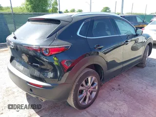 2024 Mazda CX-30 S Premium with VIN 3MVDMBDM4RM651543, listed as a IAAI auction lot 41993345 with 25,675 mi miles and . Bid and sale history available at DreamBid. Image 4.