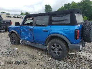 2021 Ford Bronco with VIN 1FMDE5BH9MLB02593, listed as a Copart auction lot 59632675 with 64,833 mi miles and Salvage title. Bid and sale history available at DreamBid. Image 2.