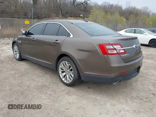 2015 Ford Taurus Limited with VIN 1FAHP2J84FG110702, listed as a IAAI auction lot 42060437 with 208,012 mi miles. Bid and sale history available at carsss.com. Image 3.