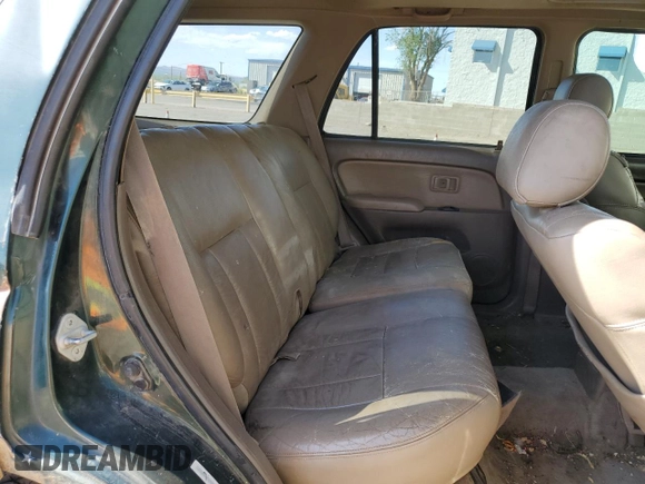 2000 Toyota 4Runner SR5 z VIN JT3HN86R4Y0274357, wystawiony jako Copart lot #53998175 z przebiegiem 306 426 mil mil oraz Szkoda całkowita • Salvage title. Historia ofert i sprzedaży dostępna na DreamBid. Obrazek 11.