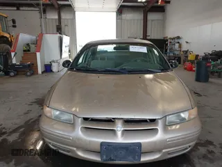 1999 Dodge Stratus z VIN 1B3EJ46X6XN587172, wystawiony jako IAAI lot #42472893 z przebiegiem 154 338 mil mil oraz . Historia ofert i sprzedaży dostępna na DreamBid. Obrazek 12.