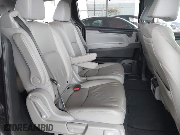 2019 Honda Odyssey Touring z VIN 5FNRL6H88KB037149, wystawiony jako IAAI lot #42356871 z przebiegiem 64 549 mil mil oraz . Historia ofert i sprzedaży dostępna na DreamBid. Obrazek 8.