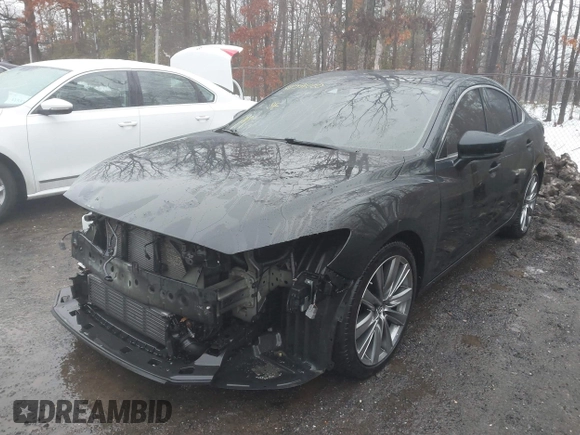 2018 Mazda 6 Grand Touring Reserve with VIN JM1GL1WY1J1308749, listed as a IAAI auction lot 41571220 with 113,041 mi miles and . Bid and sale history available at carsss.com. Image 2.