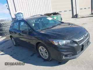 2018 Subaru Impreza Premium with VIN 4S3GTAD65J3723739, listed as a IAAI auction lot 41671819 with 61,268 mi miles. Bid and sale history available at carsss.com. Image 1.