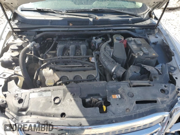 2012 Ford Taurus SEL z VIN 1FAHP2HW7CG138459, wystawiony jako Copart lot #53170075 z przebiegiem 194 617 mil mil oraz Czysty tytuł • Clean title. Historia ofert i sprzedaży dostępna na DreamBid. Obrazek 11.